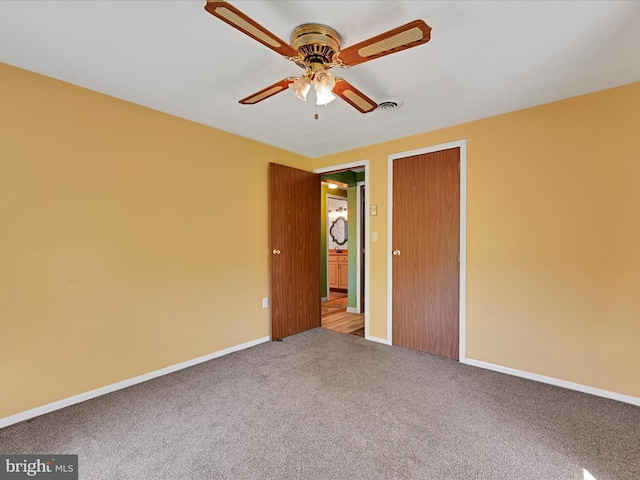 917 Houtztown Rd, Myerstown, PA 17067 - unfurnished bedroom with carpet, a ceiling fan, baseboards, visible vents, and a closet