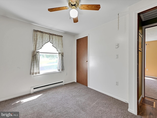 917 Houtztown Rd, Myerstown, PA 17067 - carpeted spare room with visible vents, baseboards, ceiling fan, and baseboard heating