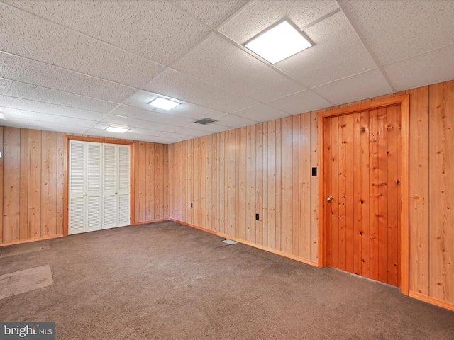 917 Houtztown Rd, Myerstown, PA 17067 - interior space with wooden walls, carpet flooring, and a paneled ceiling