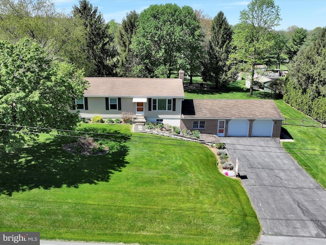 917 Houtztown Rd, Myerstown, PA 17067 - view of front of property featuring a garage, a front lawn, and driveway