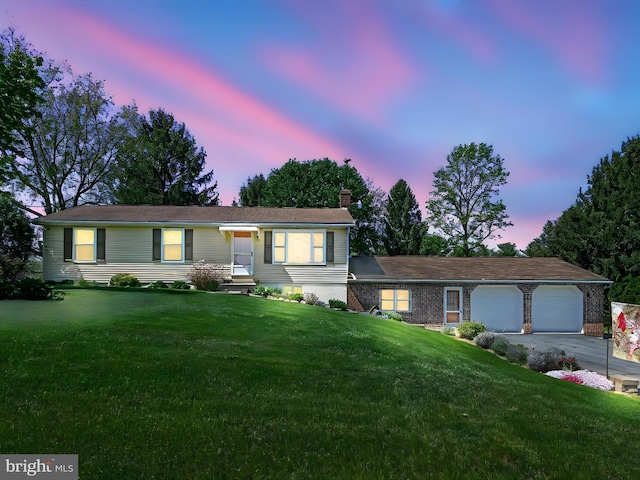 917 Houtztown Rd, Myerstown, PA 17067 - ranch-style house with an attached garage, driveway, a chimney, and a front lawn