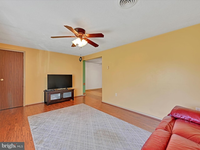 917 Houtztown Rd, Myerstown, PA 17067 - living room featuring a ceiling fan, wood finished floors, and visible vents