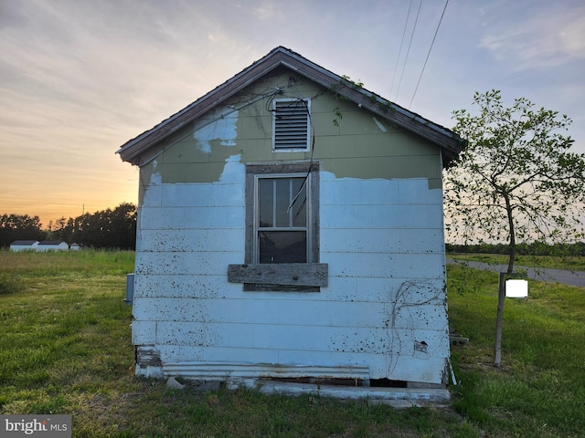 view of property exterior at dusk