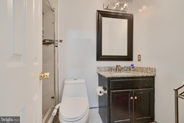 full bathroom with toilet, vanity, and a shower