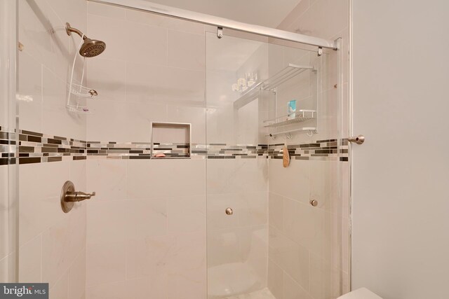 full bathroom with a stall shower