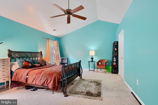 bedroom with vaulted ceiling, carpet floors, ceiling fan, and baseboards