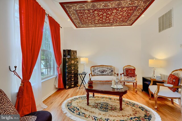 sitting room featuring wood finished floors and baseboards
