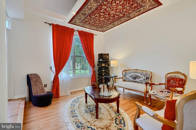 sitting room featuring wood finished floors and baseboards