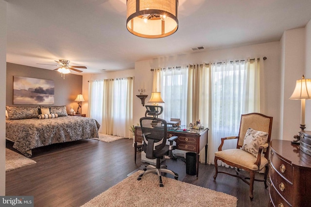 250 Parkside Ct, Woodstock, VA 22664 - bedroom with dark wood-style floors, an office area, and ceiling fan