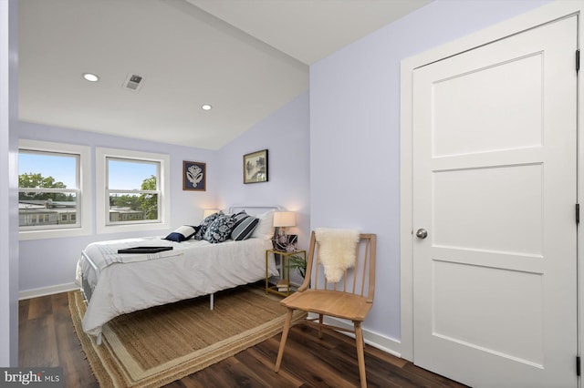 bedroom featuring vaulted ceiling, baseboards, dark wood-style flooring, and recessed lighting