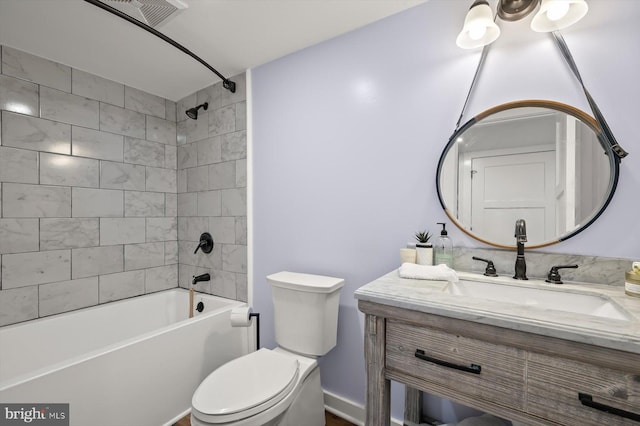 full bath with toilet, shower / washtub combination, and vanity