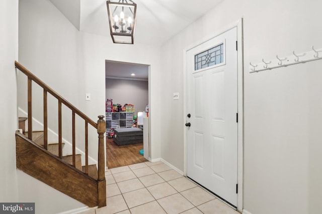 595 Tabernacle Rd, Medford, NJ 08055 - foyer featuring a chandelier, stairs, light tile patterned flooring, and baseboards