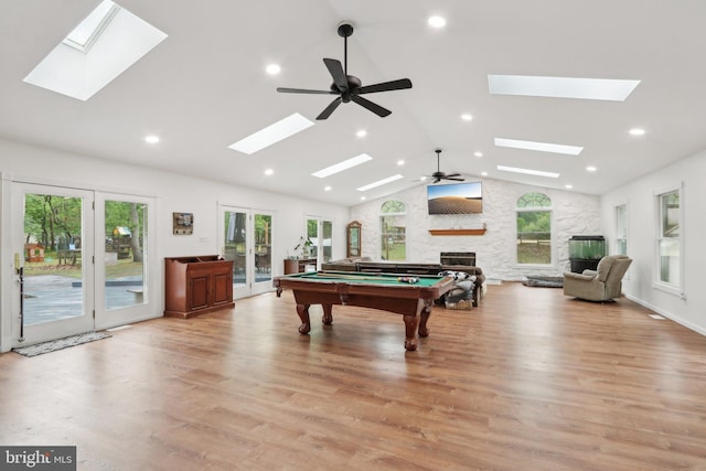 595 Tabernacle Rd, Medford, NJ 08055 - playroom featuring a skylight, a large fireplace, ceiling fan, recessed lighting, and lofted ceiling