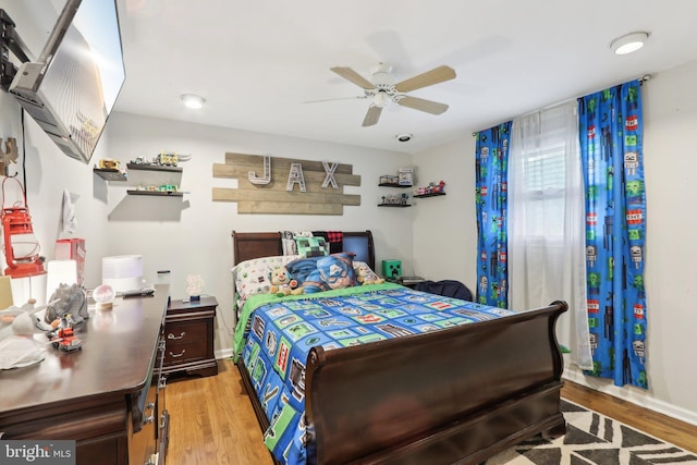 595 Tabernacle Rd, Medford, NJ 08055 - bedroom with wood finished floors, ceiling fan, and baseboards