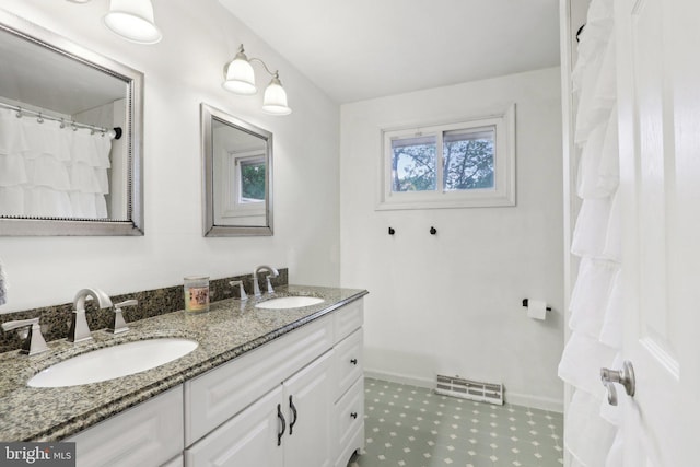 595 Tabernacle Rd, Medford, NJ 08055 - full bathroom featuring double vanity and baseboards