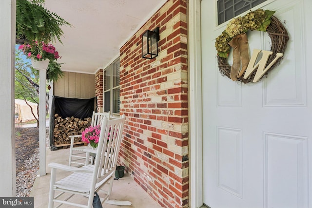 595 Tabernacle Rd, Medford, NJ 08055 - property entrance featuring covered porch and brick siding