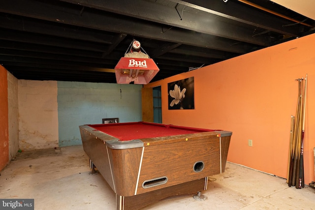 rec room featuring pool table and unfinished concrete flooring