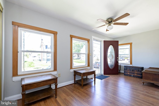 entryway with baseboards, a ceiling fan, and wood finished floors