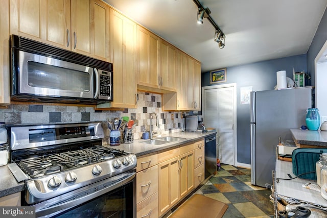 263 Medwick Garth E, Baltimore, MD 21228 - kitchen with appliances with stainless steel finishes, a sink, decorative backsplash, light brown cabinets, and rail lighting