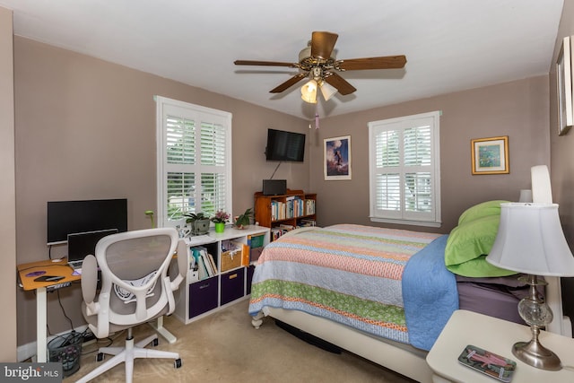 263 Medwick Garth E, Baltimore, MD 21228 - carpeted bedroom with ceiling fan and an office area