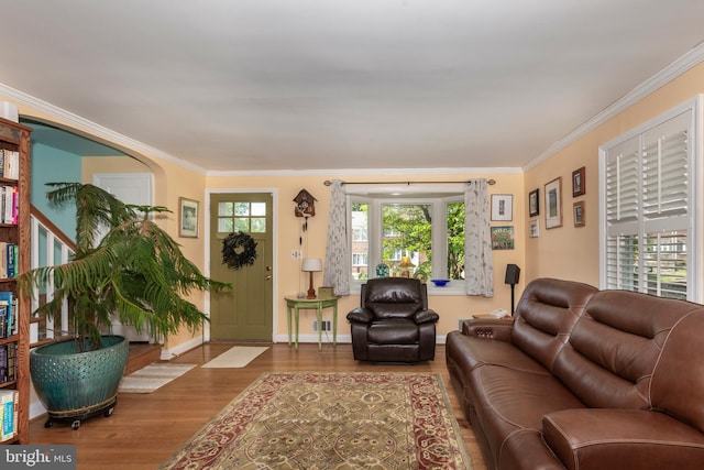 263 Medwick Garth E, Baltimore, MD 21228 - living room featuring wood finished floors, ornamental molding, and baseboards