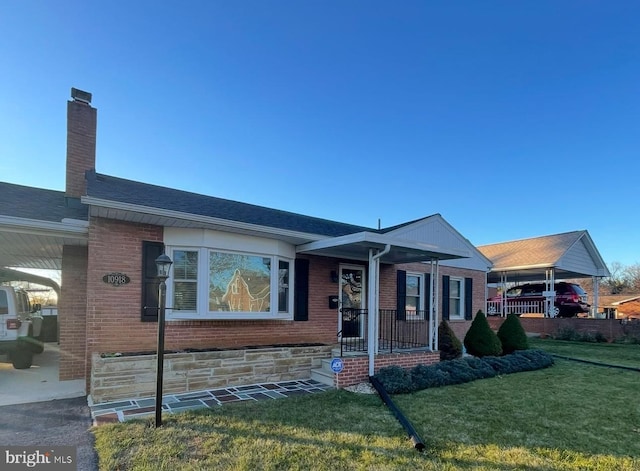 10918 Allen Ave, Hagerstown, MD 21740 - ranch-style house featuring brick siding, a front lawn, and a chimney
