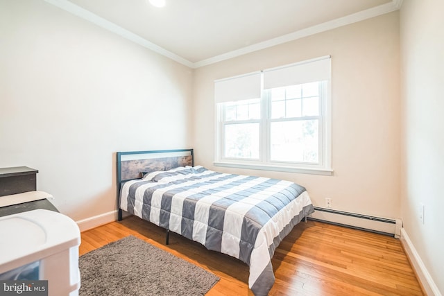 10918 Allen Ave, Hagerstown, MD 21740 - bedroom featuring ornamental molding, wood finished floors, baseboards, recessed lighting, and a baseboard heating unit