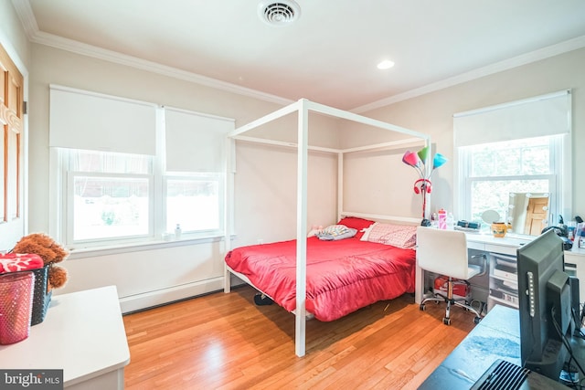 10918 Allen Ave, Hagerstown, MD 21740 - bedroom with a baseboard radiator, multiple windows, light wood-type flooring, and visible vents