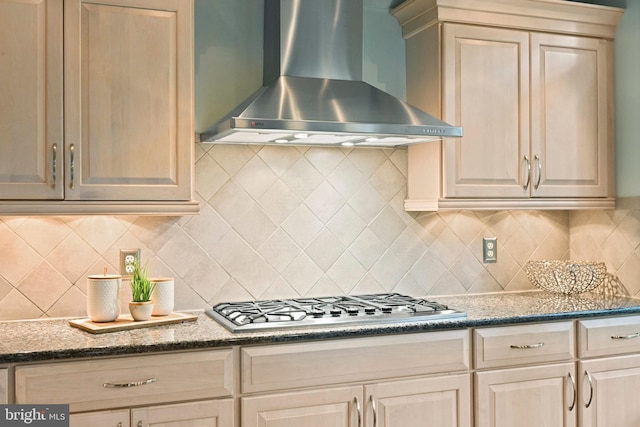503 Colony Ct NW, Vienna, VA 22180 - kitchen featuring wall chimney exhaust hood, stainless steel gas cooktop, tasteful backsplash, and dark stone countertops