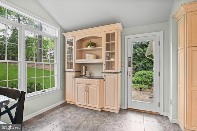 503 Colony Ct NW, Vienna, VA 22180 - doorway with lofted ceiling, healthy amount of natural light, and baseboards