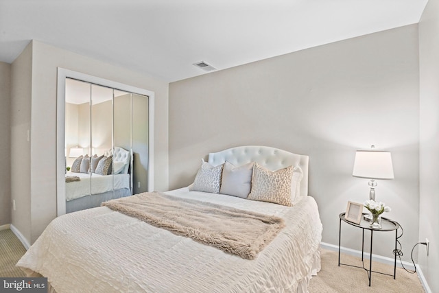 503 Colony Ct NW, Vienna, VA 22180 - carpeted bedroom with baseboards and a closet