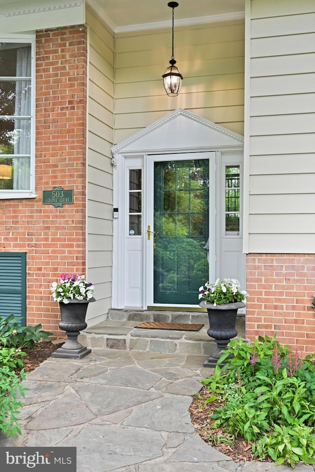 503 Colony Ct NW, Vienna, VA 22180 - doorway to property with brick siding