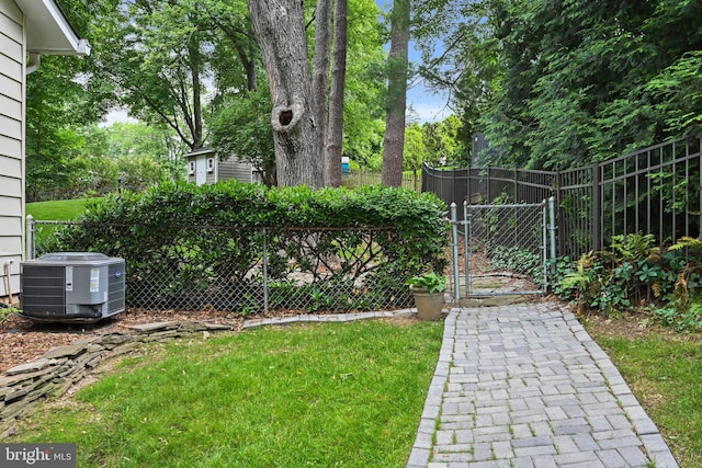 503 Colony Ct NW, Vienna, VA 22180 - view of yard featuring central air condition unit and a gate