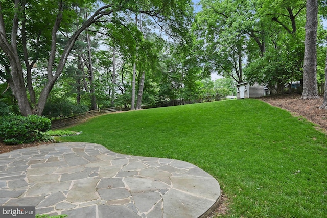 503 Colony Ct NW, Vienna, VA 22180 - view of yard featuring a patio area and an outbuilding