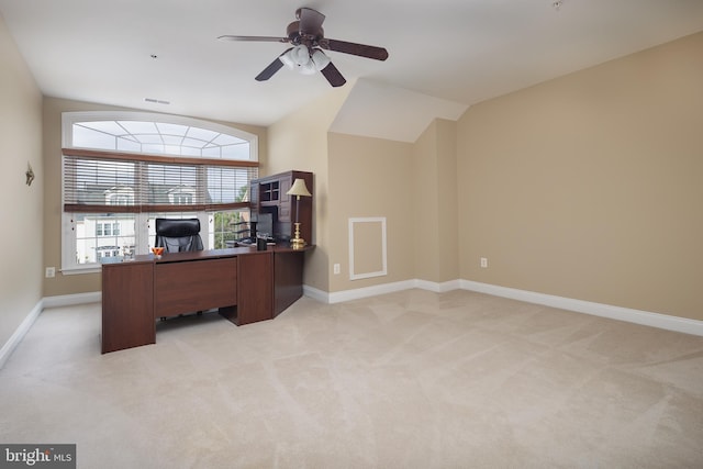 unfurnished office with a ceiling fan, baseboards, visible vents, and light carpet