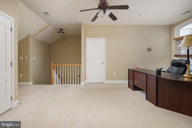 office space with a ceiling fan, light colored carpet, and visible vents