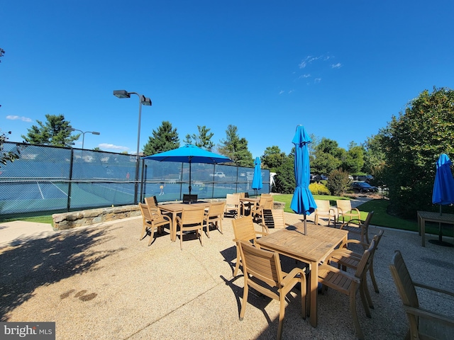 view of patio / terrace with fence and outdoor dining space