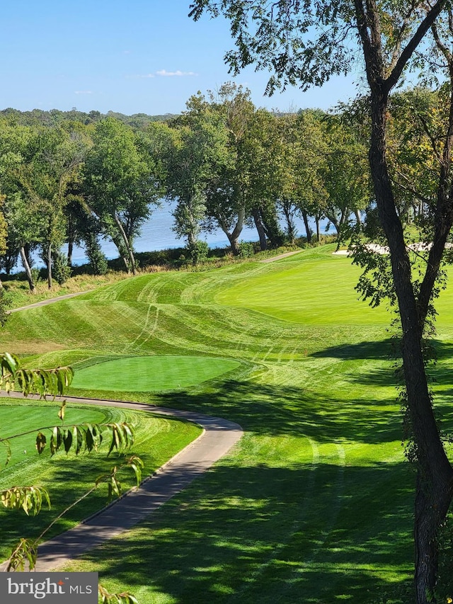 view of home's community featuring golf course view