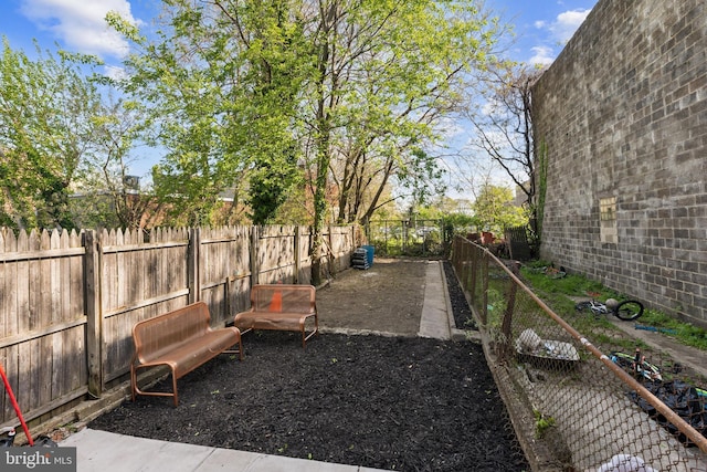 view of yard featuring a fenced backyard