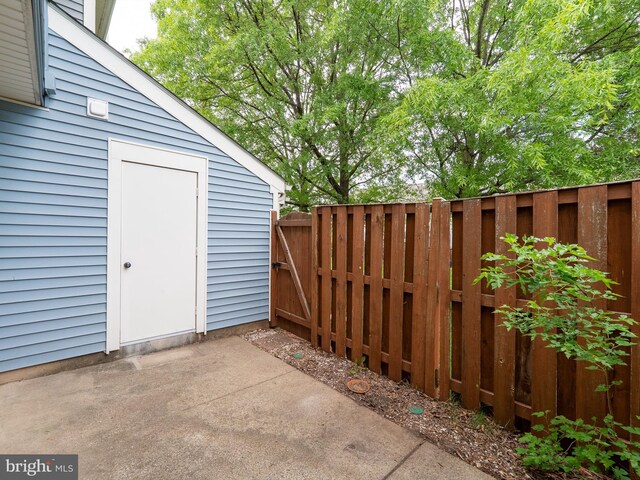 view of patio / terrace featuring fence