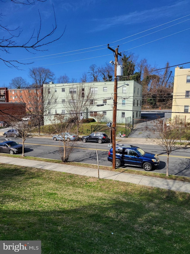 view of road featuring curbs and sidewalks
