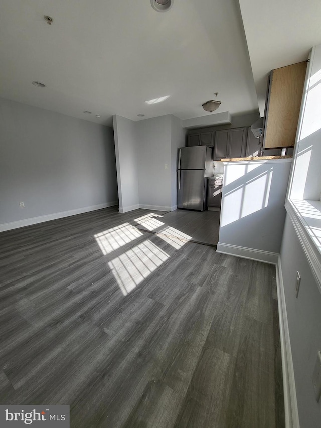 4800 C St SE Unit 104, Washington, DC 20019 - interior space featuring baseboards and dark wood-style flooring