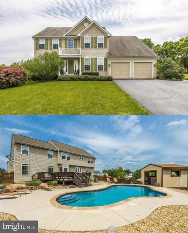 pool with a lawn, a deck, and fence