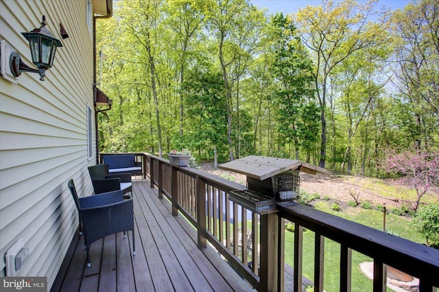deck with a wooded view
