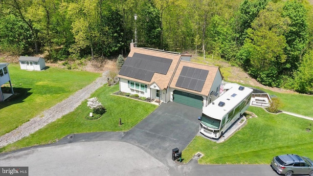 bird's eye view with a forest view