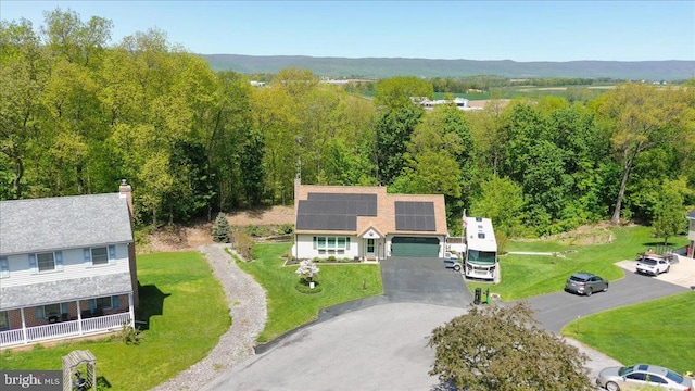 bird's eye view featuring a view of trees