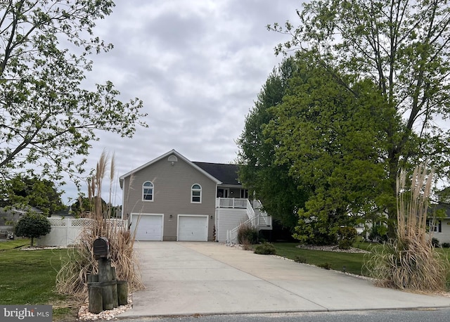 13295 Rollie Road E Rd, Bishopville, MD 21813 - view of home's exterior with stairway, driveway, and a garage