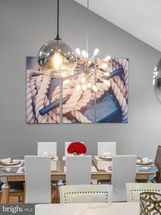 13295 Rollie Road E Rd, Bishopville, MD 21813 - dining area with a chandelier and vaulted ceiling