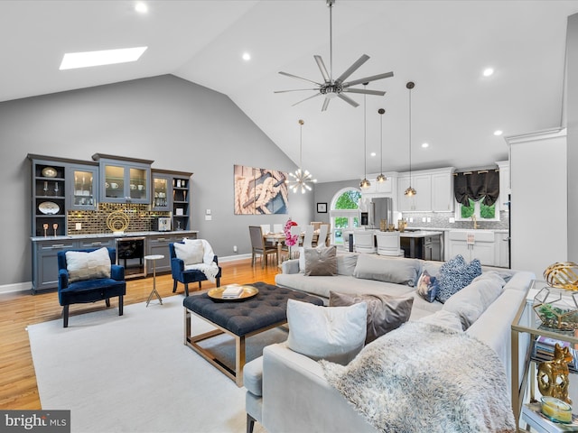 13295 Rollie Road E Rd, Bishopville, MD 21813 - living room with ceiling fan, high vaulted ceiling, light wood-style flooring, baseboards, and recessed lighting