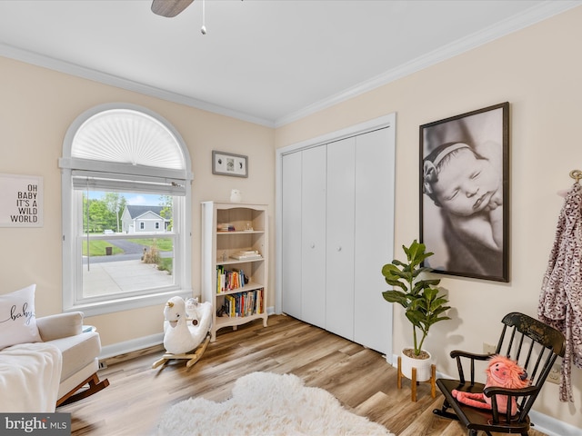 13295 Rollie Road E Rd, Bishopville, MD 21813 - sitting room featuring crown molding, wood finished floors, and a ceiling fan